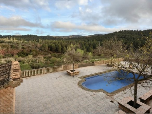 Pool terrace with pine forest views, Lorca estate