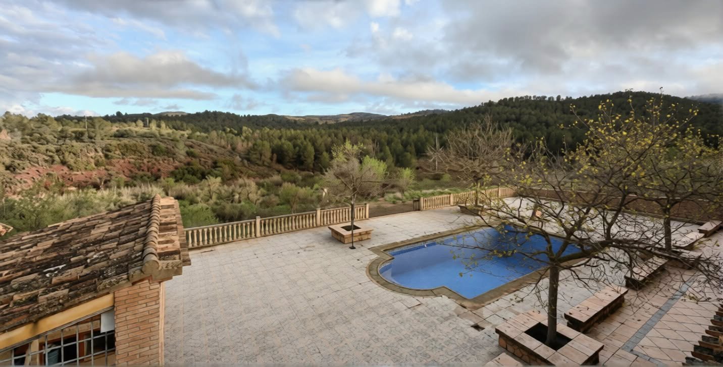 Pool terrace with pine forest views, Lorca estate