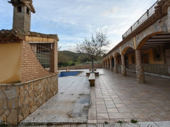 Covered arched gallery with lanterns, Lorca estate