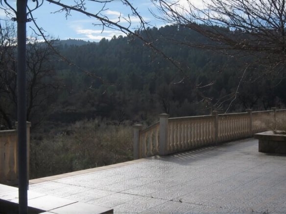Balustrade terrace overlooking pine forest, Lorca estate