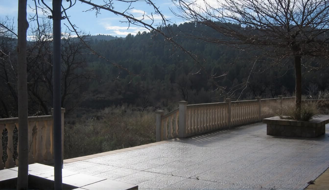 Balustrade terrace overlooking pine forest, Lorca estate
